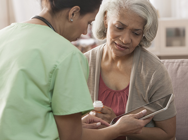 Woman talking to doctor